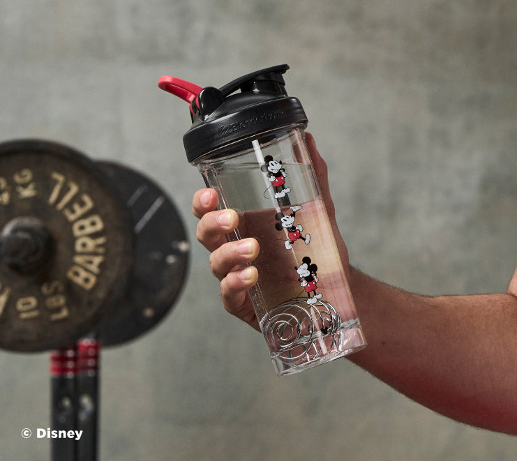 pro-series-r5 Mickey_Mouse_Protein_Shaker_Bottle_Being_Held_In_the_Gym.jpg
